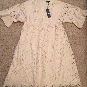 A boutique creme lace dress(size medium)